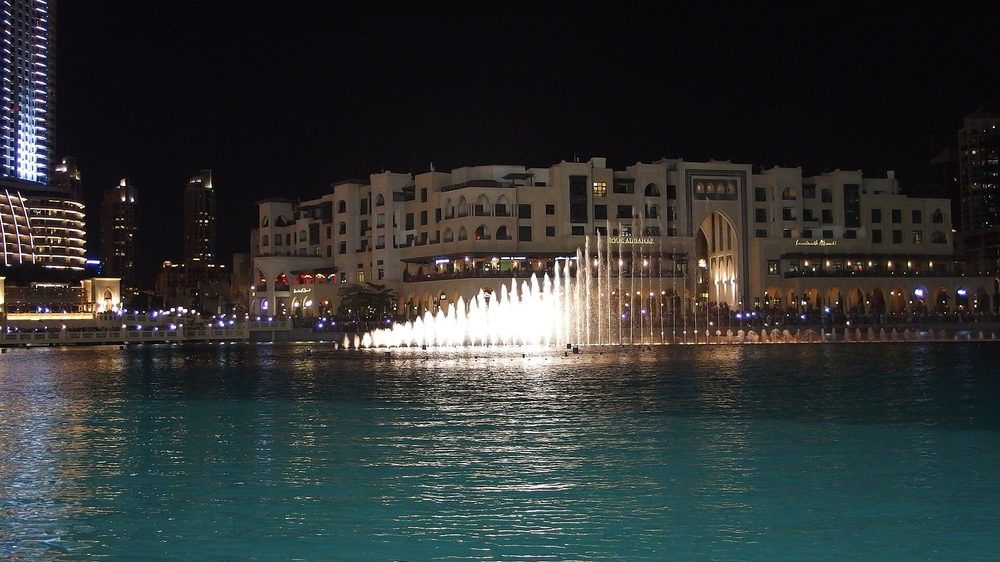 Downtown Dubai glowing on a summer evening