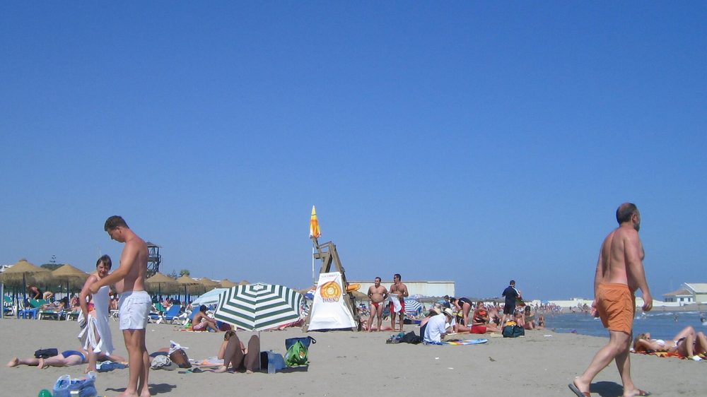 A beach shows the best time to visit the Costa del Sol in summer