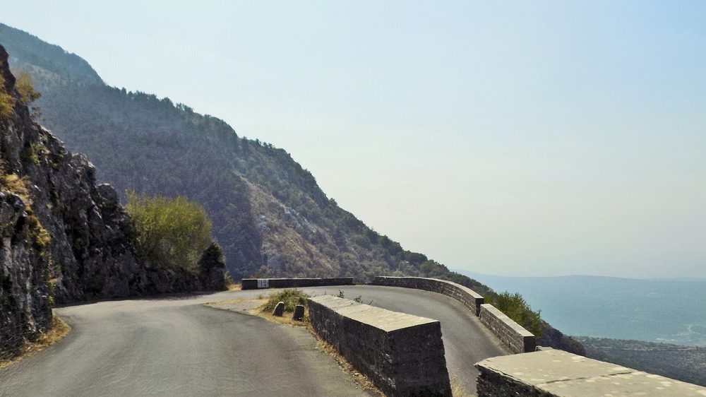 The Kotor serpentine mountain road winding above the bay in Montenegro