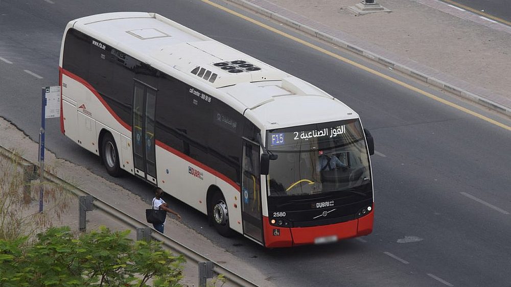 An RTA bus serving a route across Dubai